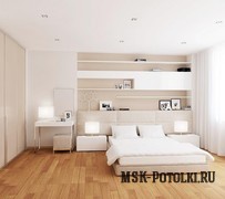 Белый матовый потолок с точечным освещением в спальне
