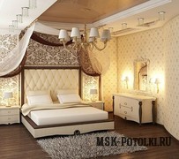 Натяжной потолок золотого цвета в спальне